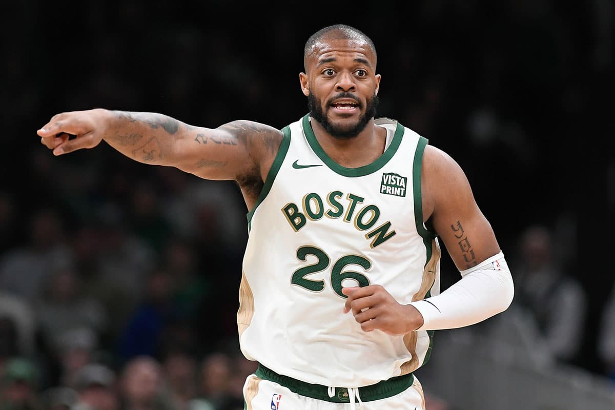 Boston Celtics forward Xavier Tillman Sr. (26) sets the play against the Portland Trail Blazers during the second half at TD Garden.