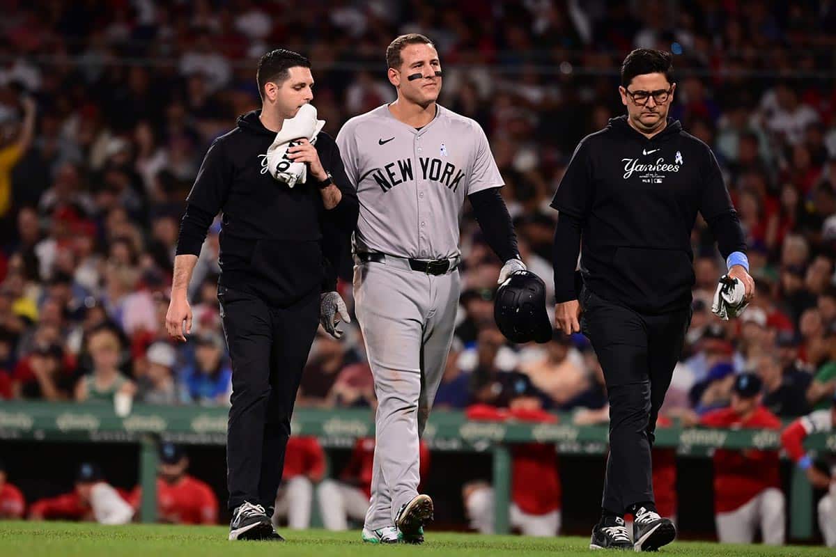 New York Yankees first baseman Anthony Rizzo (48) returns to the dugout after being injured at first base during the seventh inning at Fenway Park.