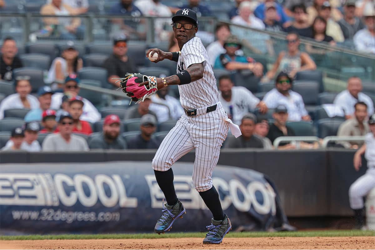 New York Yankees third baseman Jazz Chisholm Jr. (13) throws the ball to first base for an out during the third inning against the Toronto Blue Jays at Yankee Stadium. 