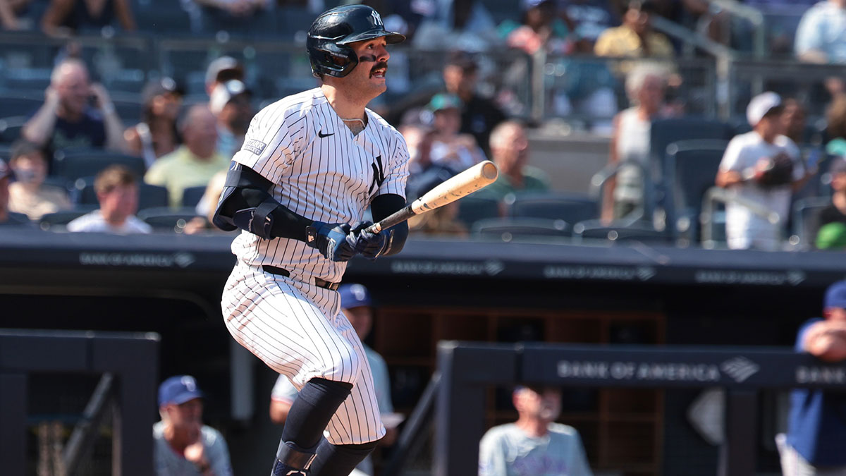 New York Yankees catcher Austin Wells (28) doubles during the seventh inning against the Texas Rangers at Yankee Stadium.