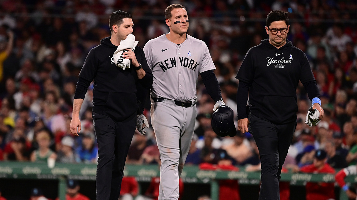New York Yankees first baseman Anthony Rizzo (48) returns to the dugout after being injured at first base during the seventh inning at Fenway Park.