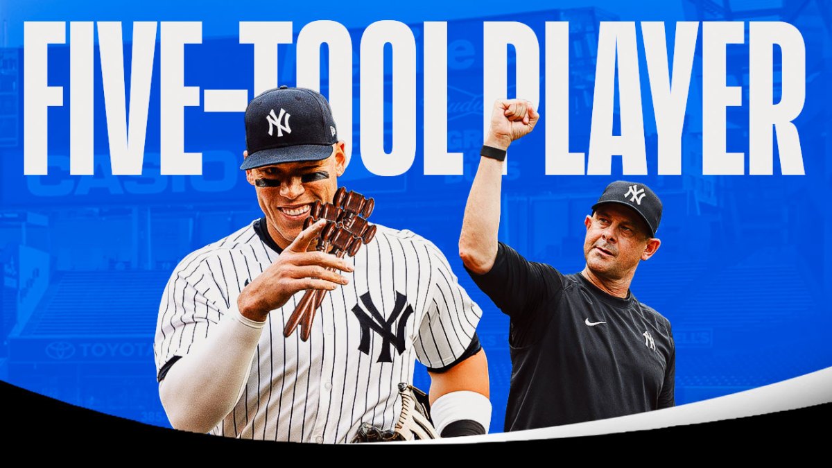 Yankees' Aaron Judge holding five gavels, with Aaron Boone smiling at him. caption below: FIVE-TOOL PLAYER