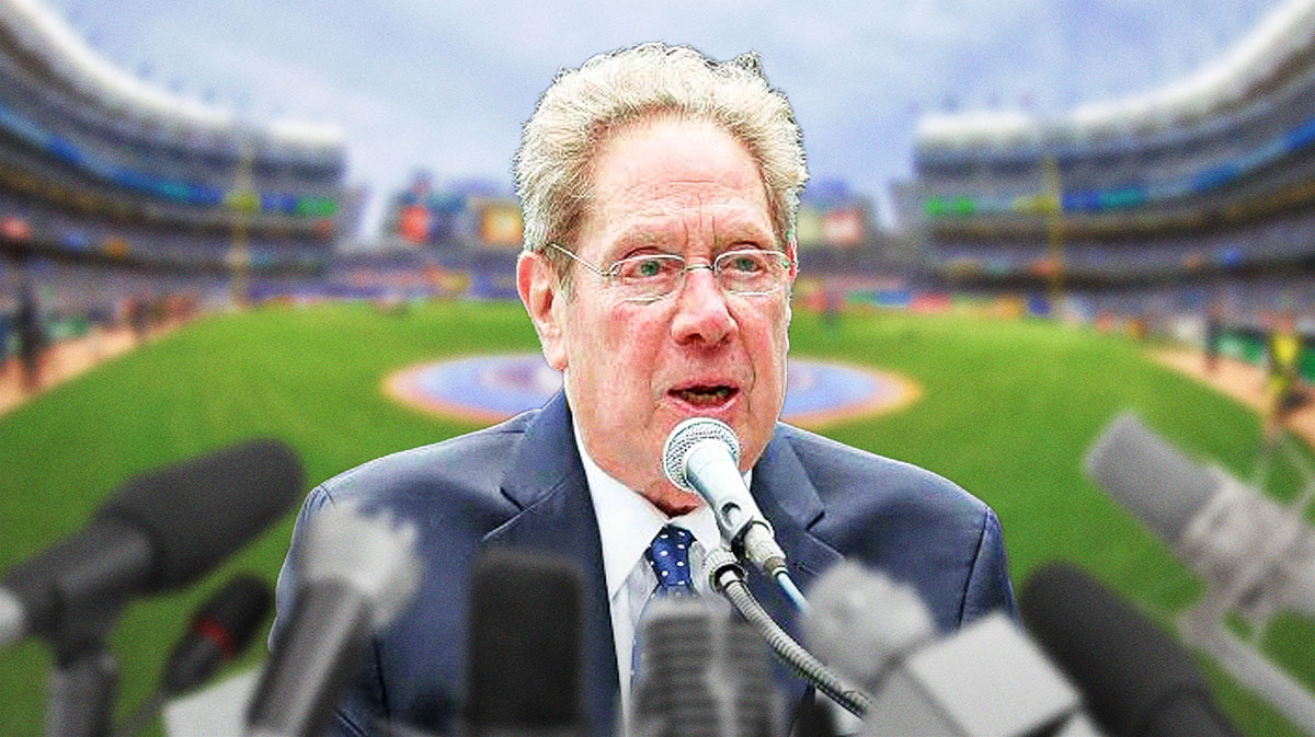 New York Yankees radio announcer John Sterling screaming into a microphone from inside a broadcasting booth above Yankees Stadium