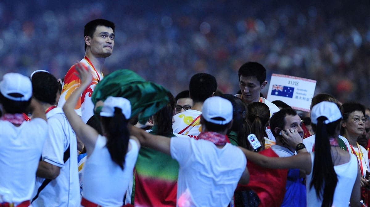 China basketball center Yao Ming is taller than the rest of the crowd at closing ceremonies at National Stadium in the 2008 Beijing Olympics.