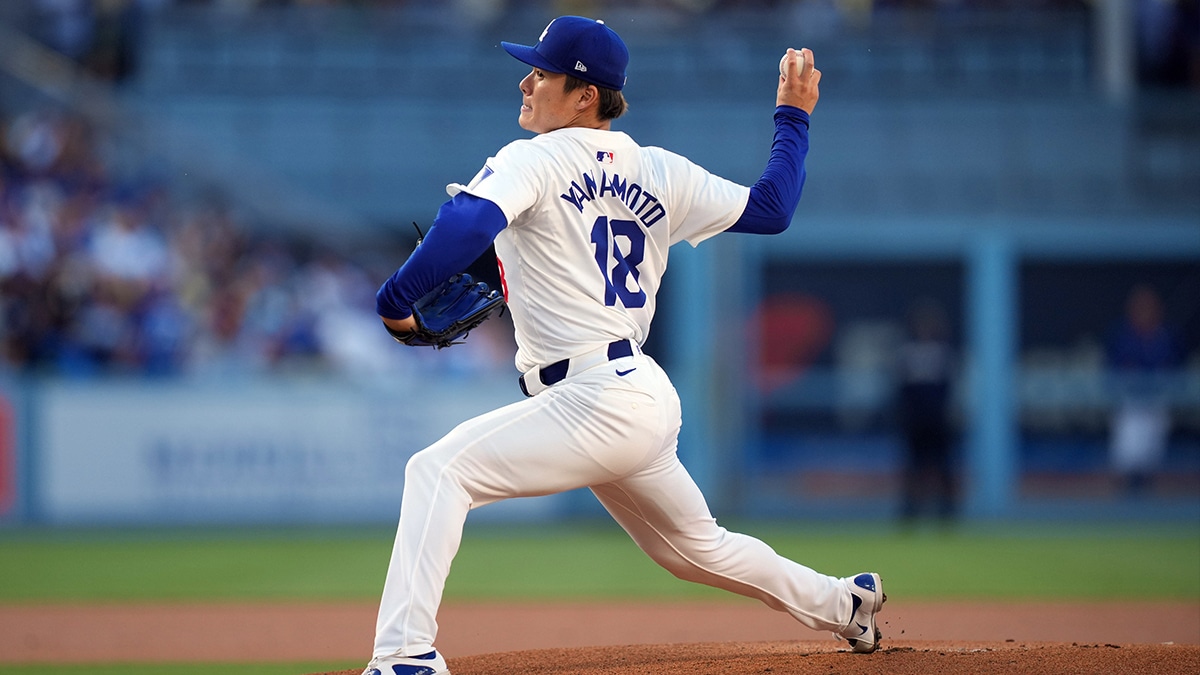 Jun 15, 2024; Los Angeles, California, USA; Los Angeles Dodgers starting pitcher Yoshinobu Yamamoto (18) throws in the first inning against the Kansas City Royals at Dodger Stadium. 