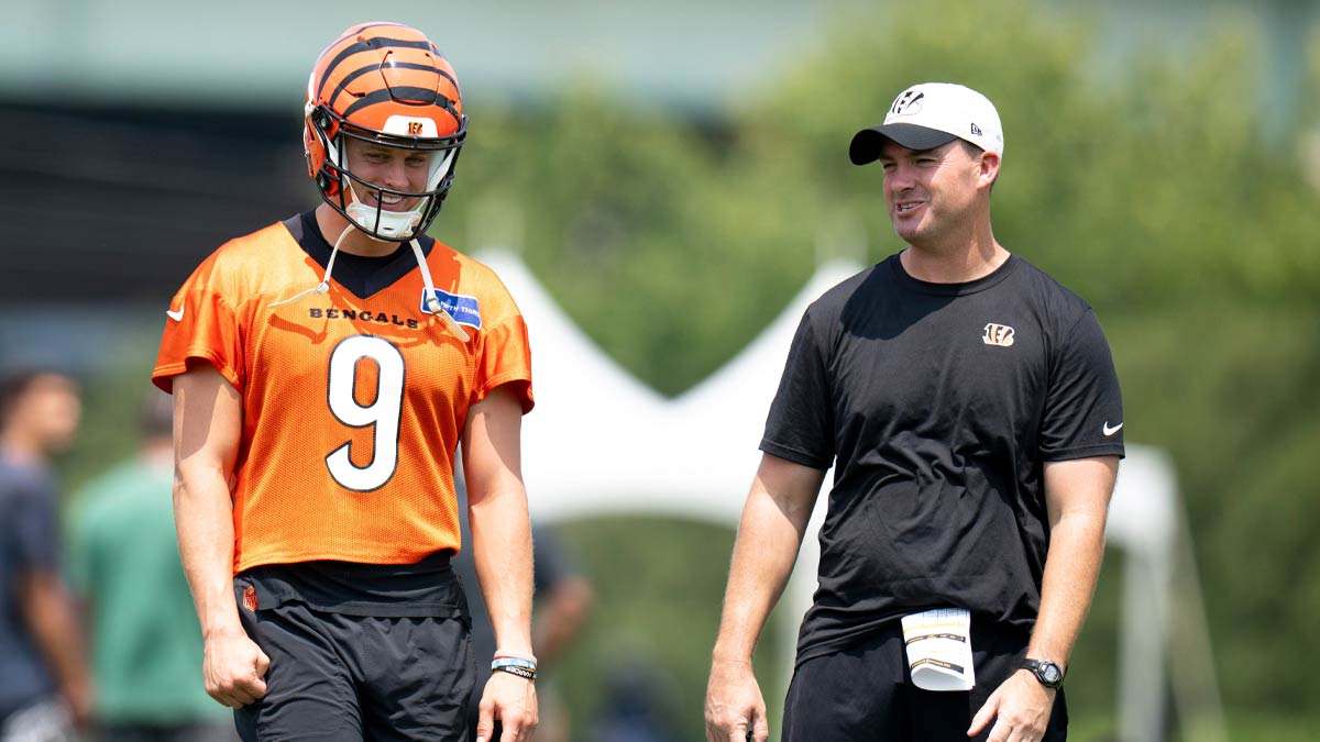 Cincinnati Bengals quarterback Joe Burrow (9) talks with Cincinnati Bengals head coach Zac Taylor during Cincinnati Bengals training camp in Cincinnati on Friday, July 26, 2024.