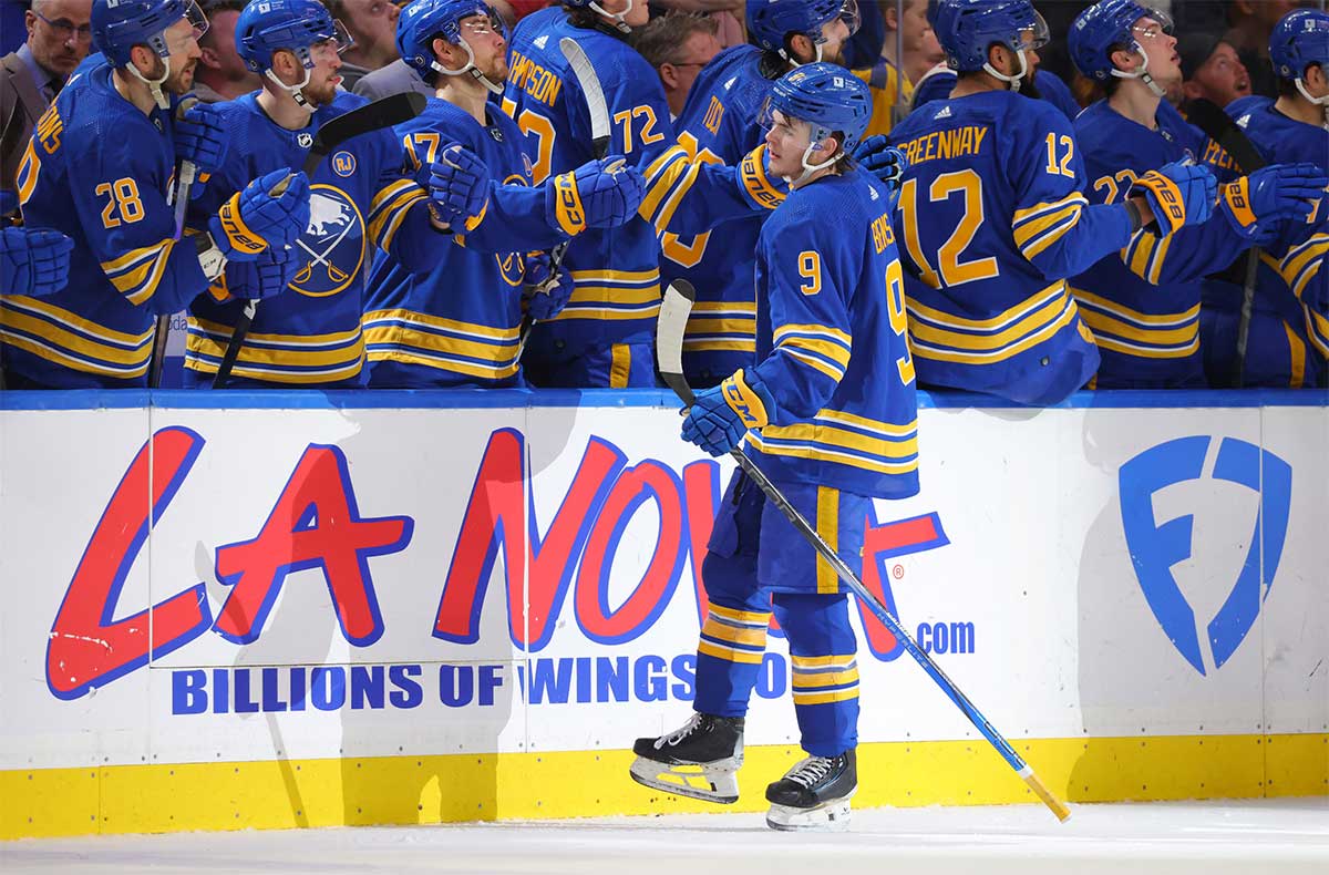 Buffalo Sabres left wing Zach Benson (9) celebrates his goal with teammates during the first period against the Washington Capitals at KeyBank Center.