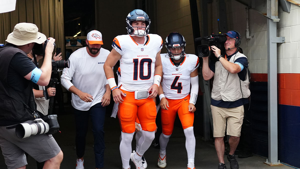 Denver Broncos quarterback Bo Nix (10) and quarterback Zach Wilson (4) before the preseason game against the Green Bay Packers at Empower Field at Mile High.