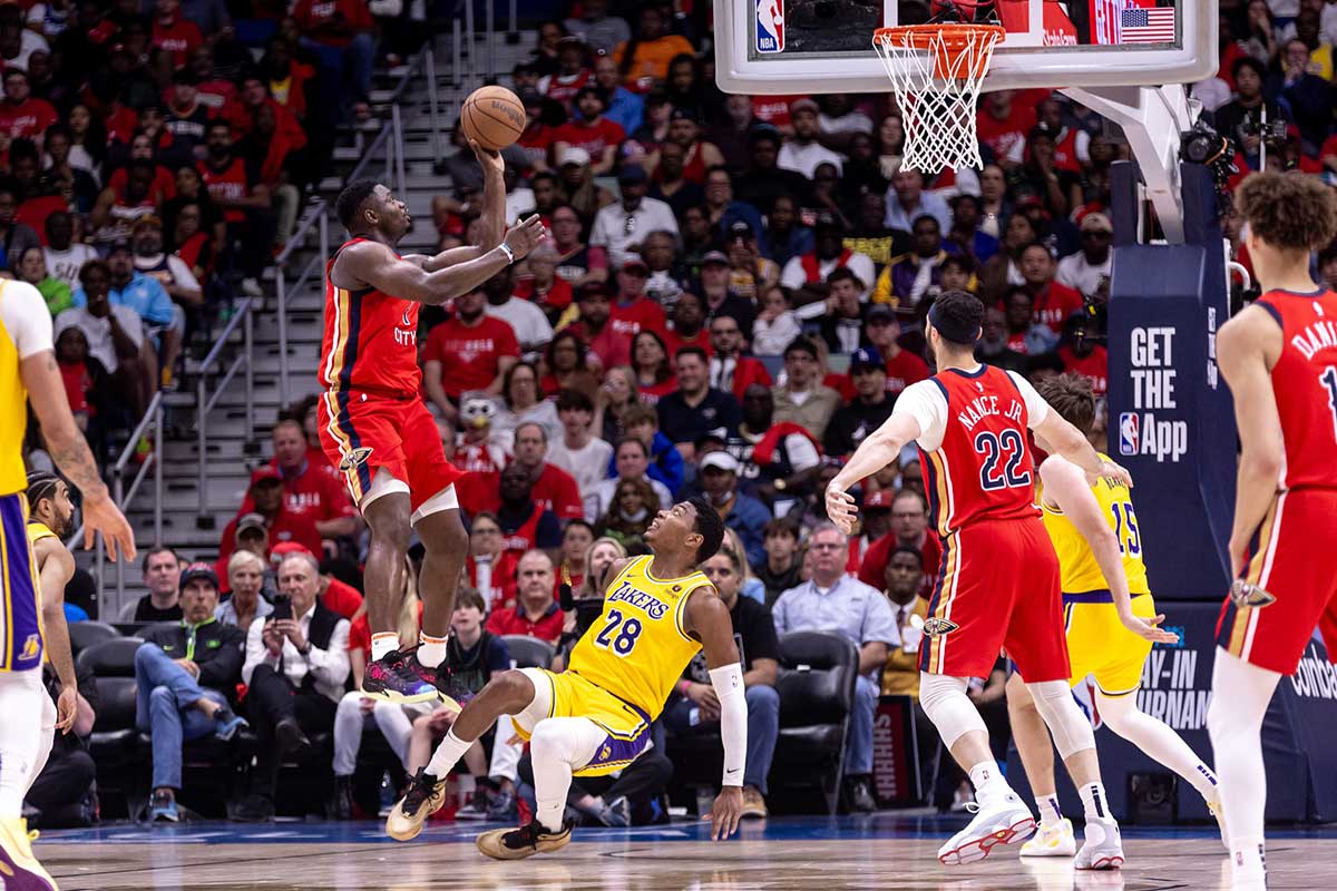 New Orleans Pelicans forward Zion Williamson (1) shoots a jump shot against Los Angeles Lakers forward Rui Hachimura (28) during the second half of a play-in game of the 2024 NBA playoffs at Smoothie King Center. 