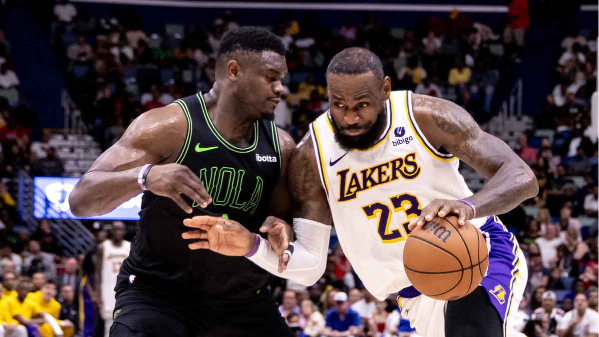 Los Angeles Lakers forward LeBron James (23) dribbles against New Orleans Pelicans forward Zion Williamson (1) during the second half at Smoothie King Center. 