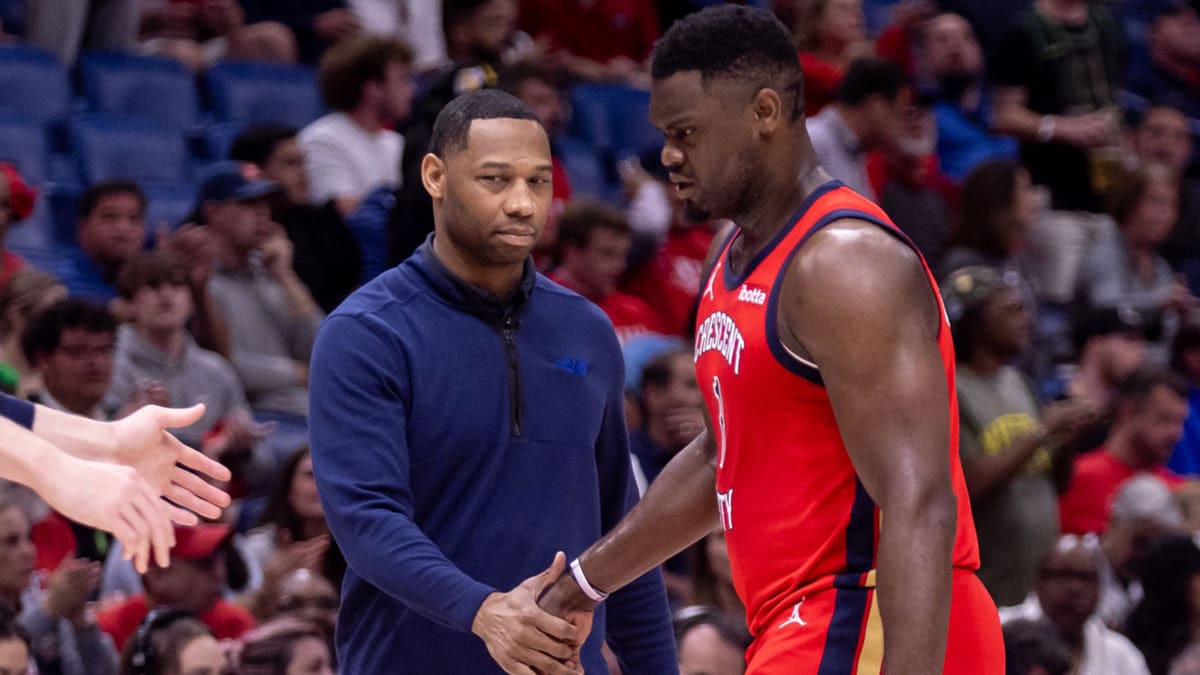 New Orleans Pelicans forward Zion Williamson (1) reacts with New Orleans Pelicans head coach Willie Green