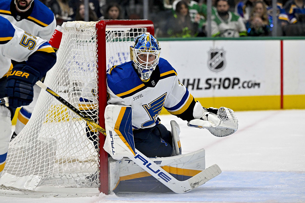 St. Louis Blues goaltender Jordan Binnington (50) faces the Dallas Stars attack during the overtime period at the American Airlines Center.