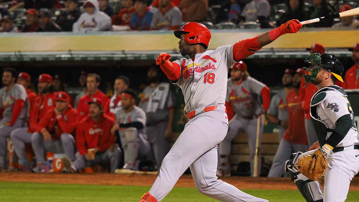St. Louis Cardinals right fielder Jordan Walker (18) hits a sacrifice fly to score a run against the Oakland Athletics during the sixth inning at Oakland-Alameda County Coliseum.