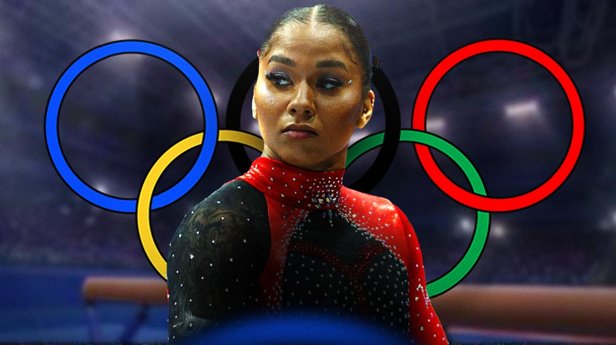 Jordan Chiles frowns next to Paris Olympics logo