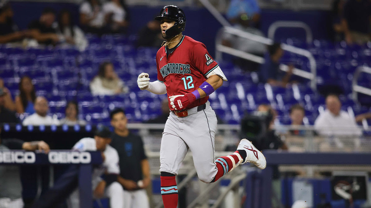 Arizona Diamondbacks left fielder Lourdes Gurriel Jr. (12) circles the bases after hitting a solo home run against the Miami Marlins during the sixth inning at loanDepot Park.