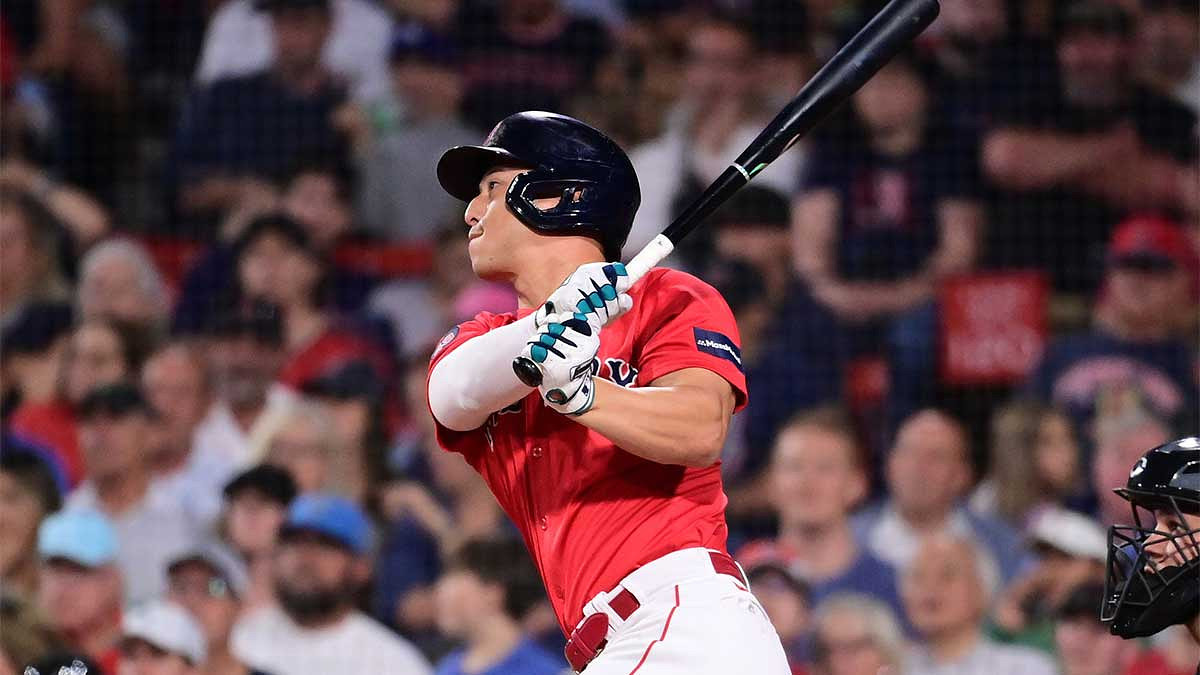 Boston Red Sox outfielder Rob Refsnyder (30) hits a home run against the Arizona Diamondbacks during the sixth inning at Fenway Park.