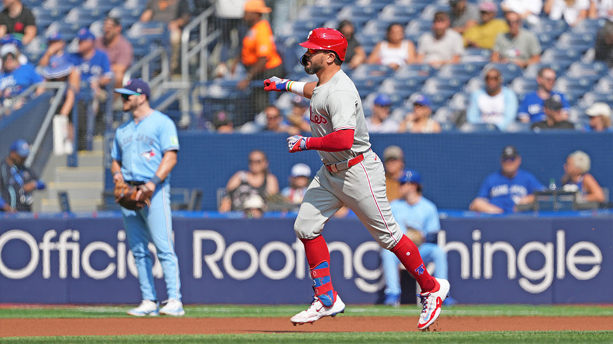 Philadelphia Phillies left fielder Kyle Schwarber (12) runs the bases after hitting home run against the Toronto Blue Jays during the first inning at Rogers Centre.