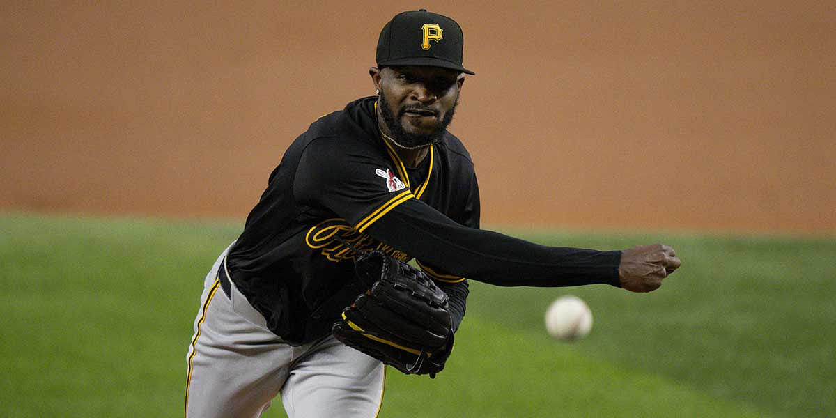 Pittsburgh Pirates starting pitcher Domingo German (0) pitches against the Texas Rangers during the first inning at Globe Life Field.