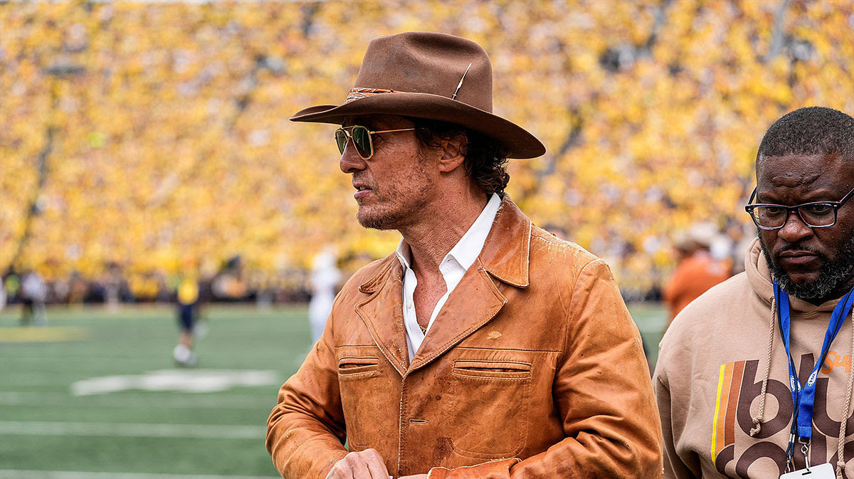 Actor Matthew McConaughey walks along the Texas sideline during the first half at Michigan Stadium in Ann Arbor on Saturday, September 7, 2024.