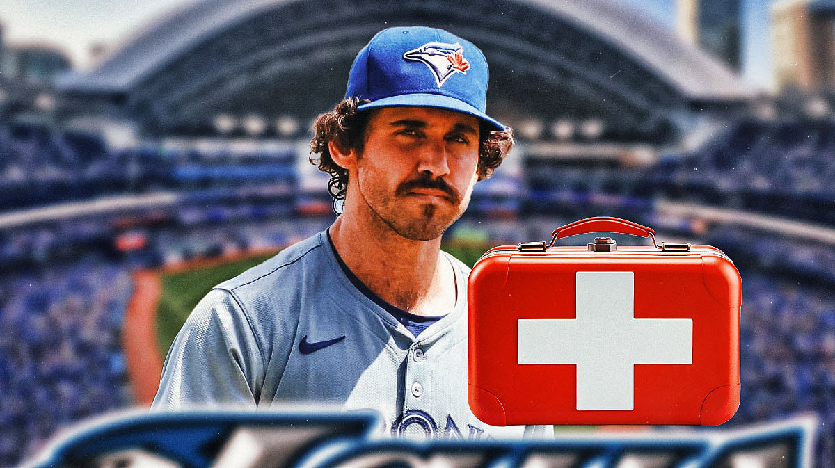 Jordan Romano with a first aid kit