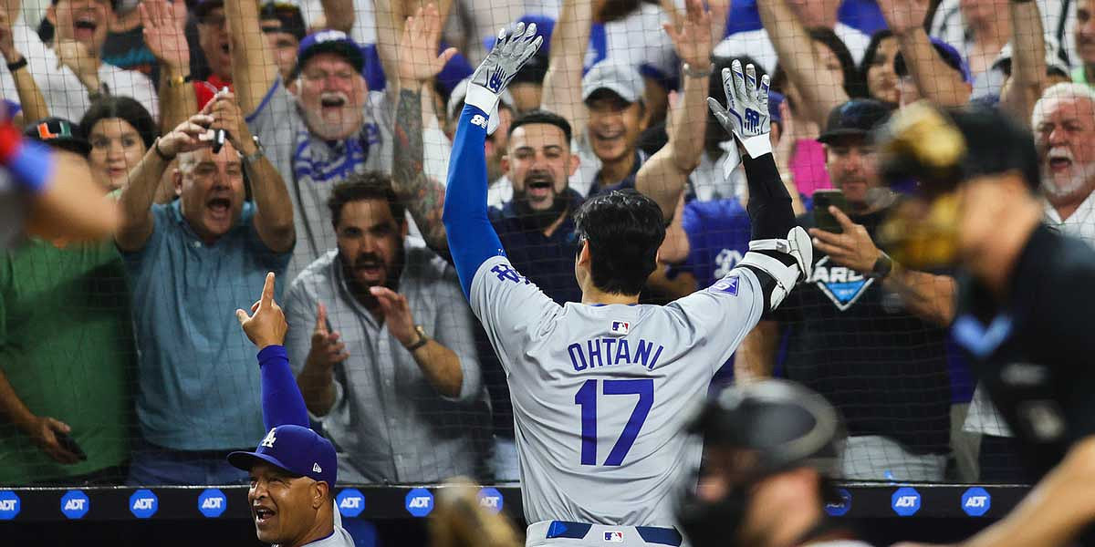 Los Angeles Dodgers designated hitter Shohei Ohtani (17) reacts to a standing ovation from the fans after hitting his 50th home run of the season against the Miami Marlins during the seventh inning at loanDepot Park.