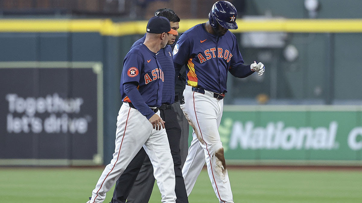 Houston Astros left fielder Yordan Alvarez (44) walks off the field after an apparent injury during the third inning against the Los Angeles Angels at Minute Maid Park.
