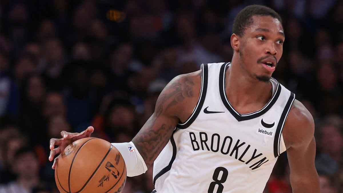 Brooklyn Nets guard Lonnie Walker IV (8) dribbles up court during the first half against the New York Knicks at Madison Square Garden.