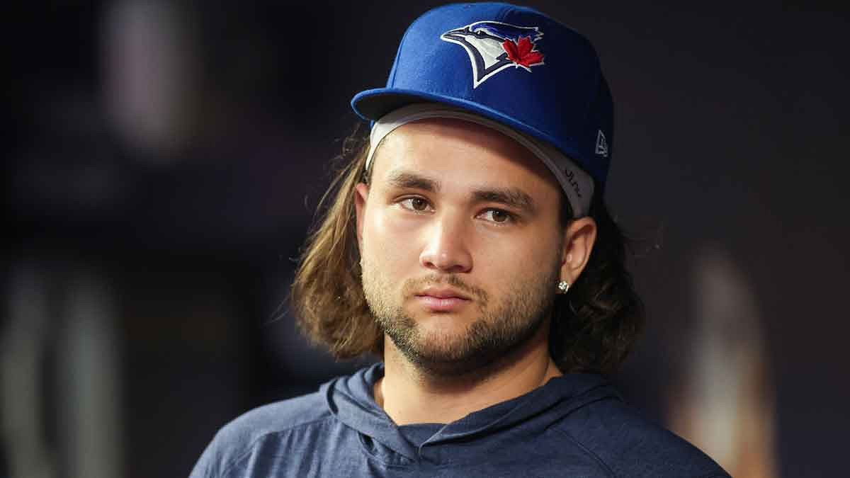 Toronto Blue Jays shortstop Bo Bichette (11) in the dugout against the Atlanta Braves in the sixth inning at Truist Park.