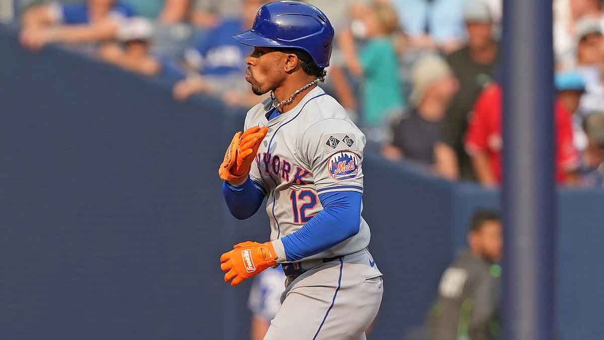 New York Mets shortstop Francisco Lindor (12) runs the bases after hitting a home run against the Toronto Blue Jays during the ninth inning at Rogers Centre.