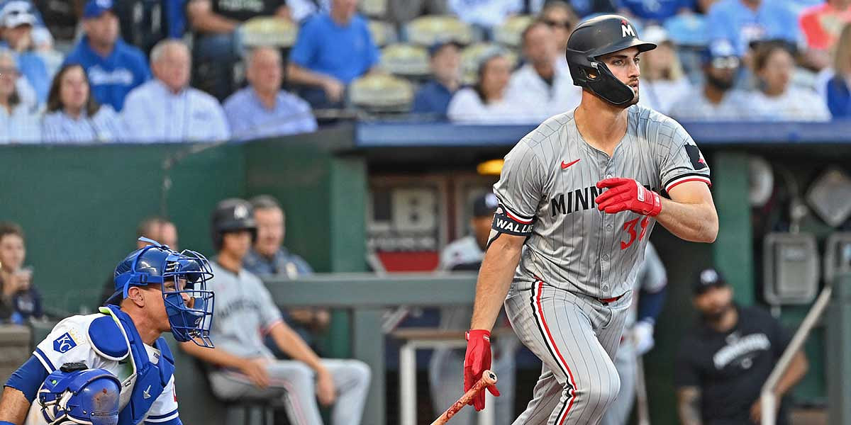 Minnesota Twins left fielder Matt Wallner (38) hits a RBI double in the third inning against the Kansas City Royals at Kauffman Stadium.