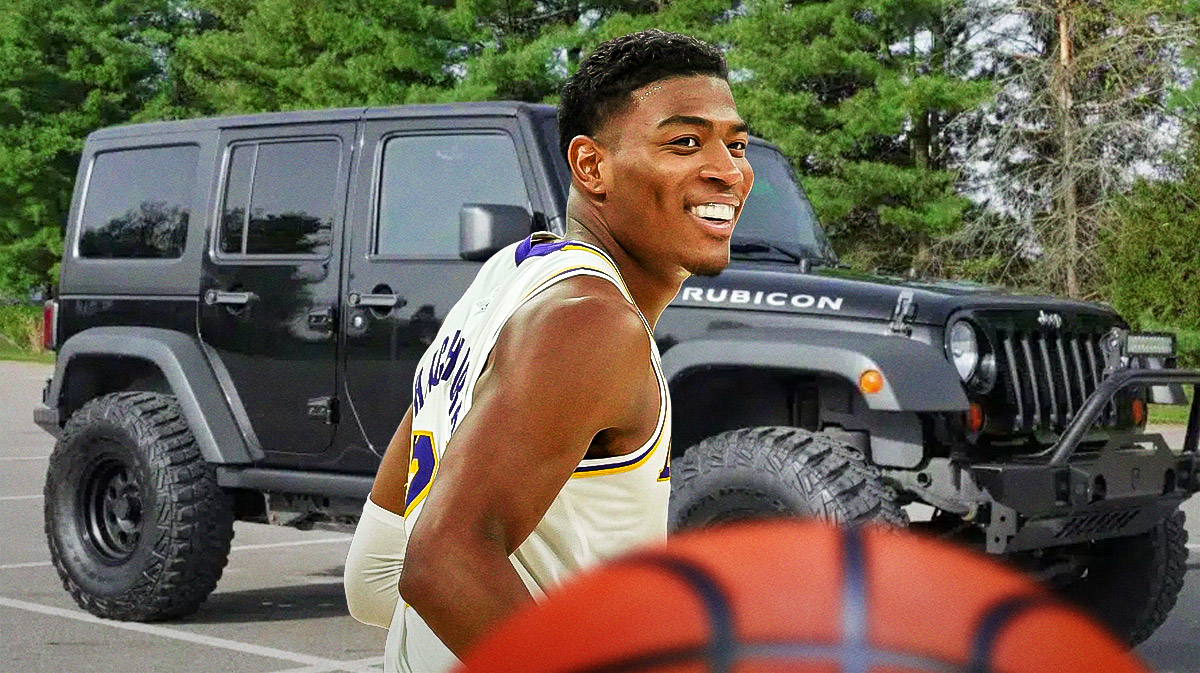 Rui Hachimura in front of a car from his collection.