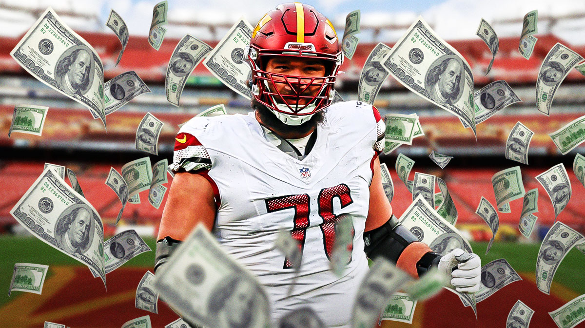 Commanders Sam Cosmi surrounded by money