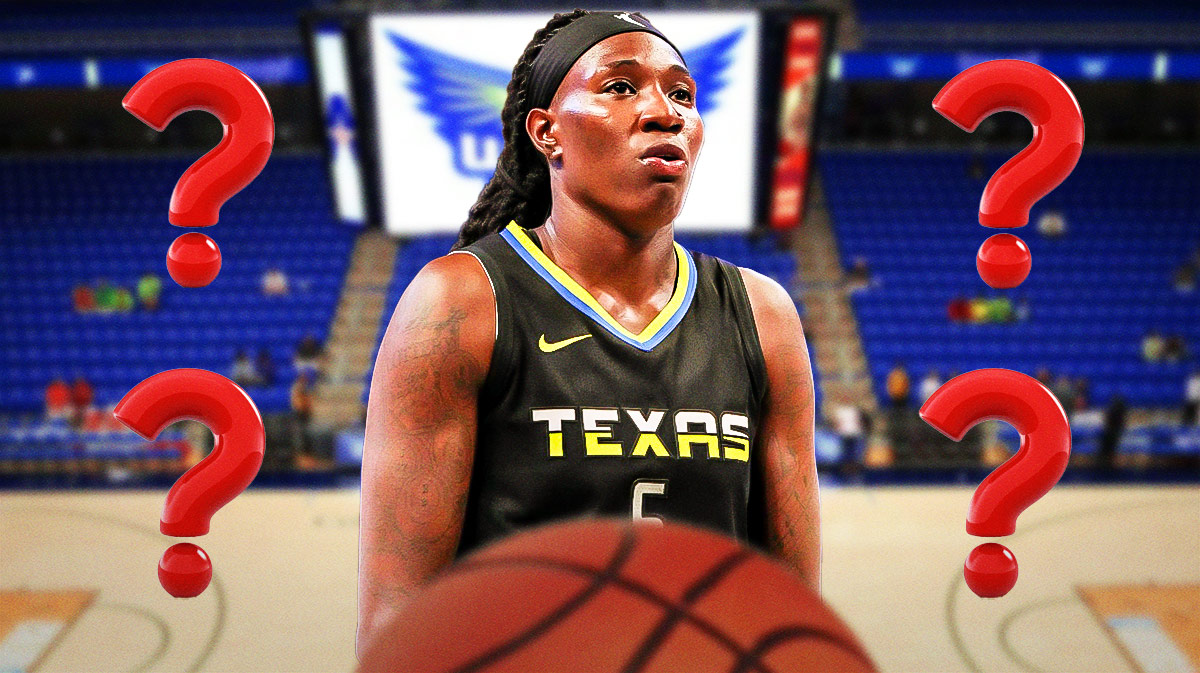 Wings Natasha Howard looking serious with question marks everywhere.