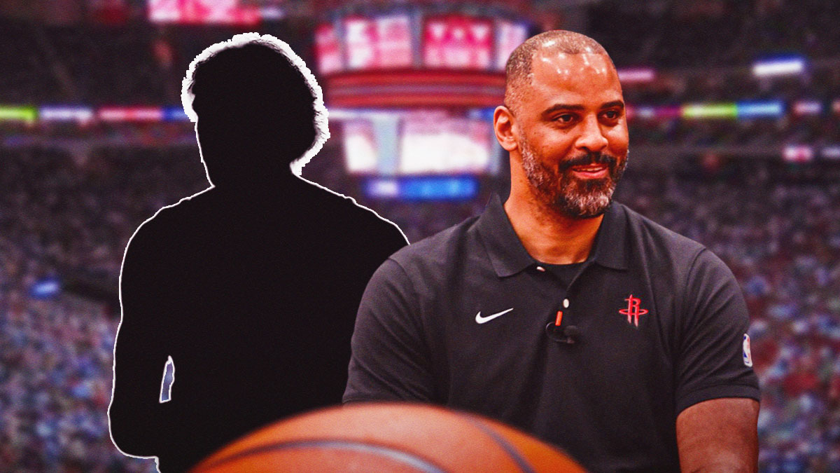 Ime Udoka in Houston Rockets coaching uniform. Silhouette/shadow of basketball player beside him