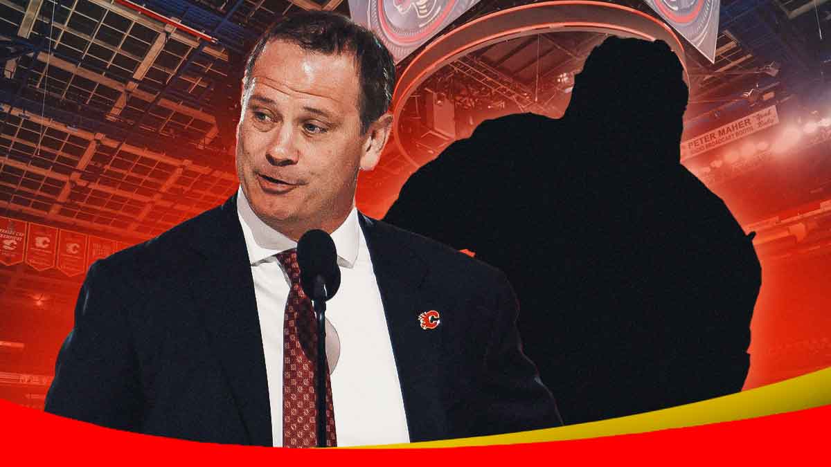 Craig Conroy and a black player silhouette inside the Saddledome