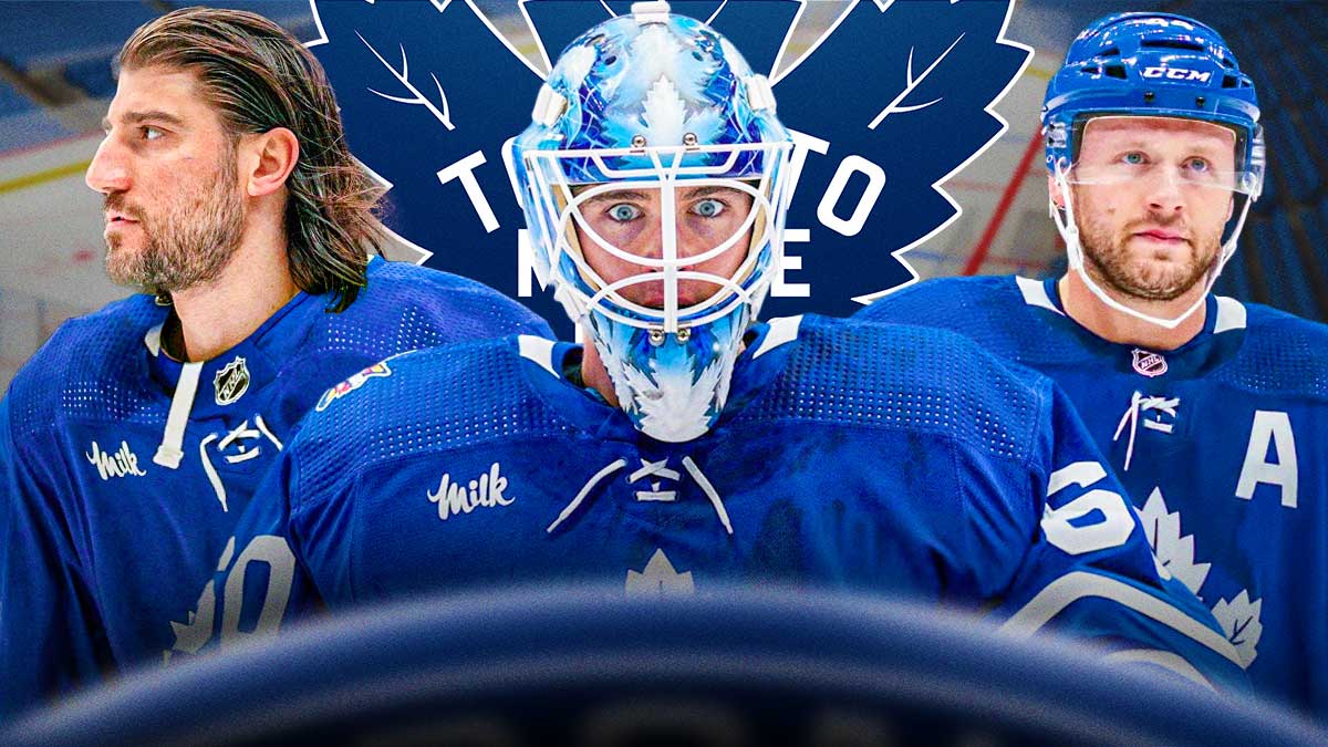 Chris Tanev, Joseph Woll, and Morgan Reilly in front of a Maple Leafs logo and ice rink.