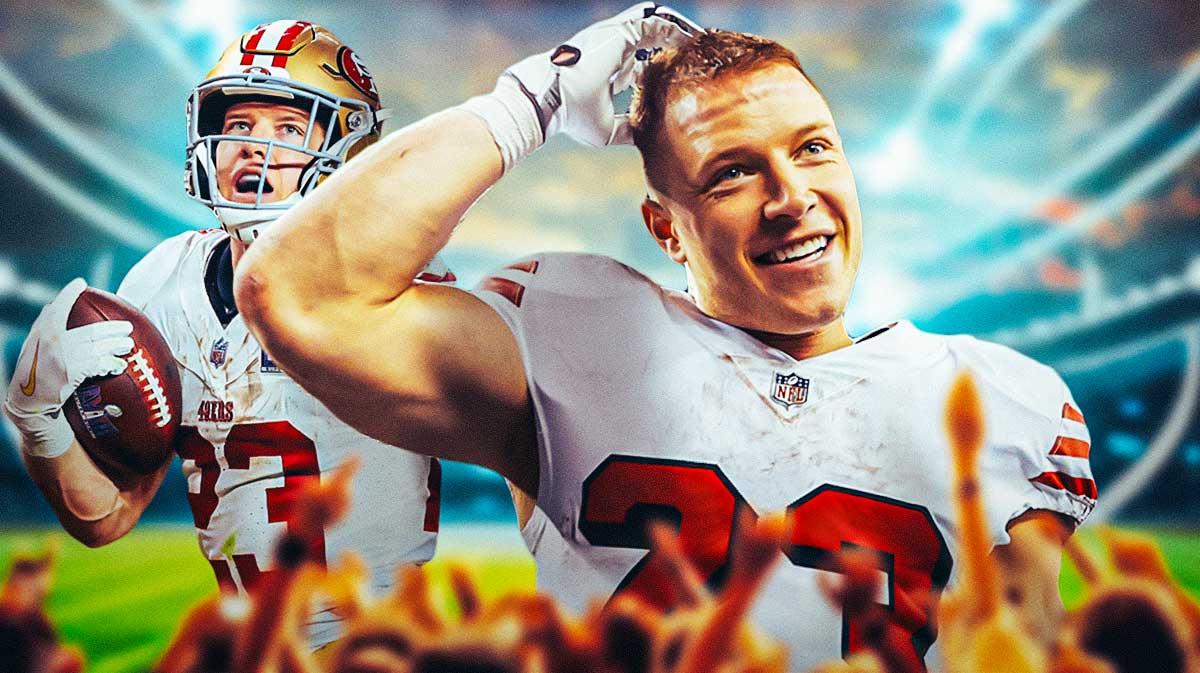 Christian McCaffrey smiles in 49ers gear