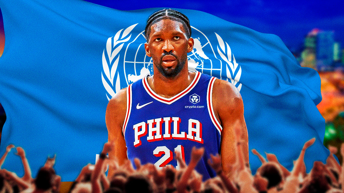 76ers' Joel Embiid in front of the United Nations flag