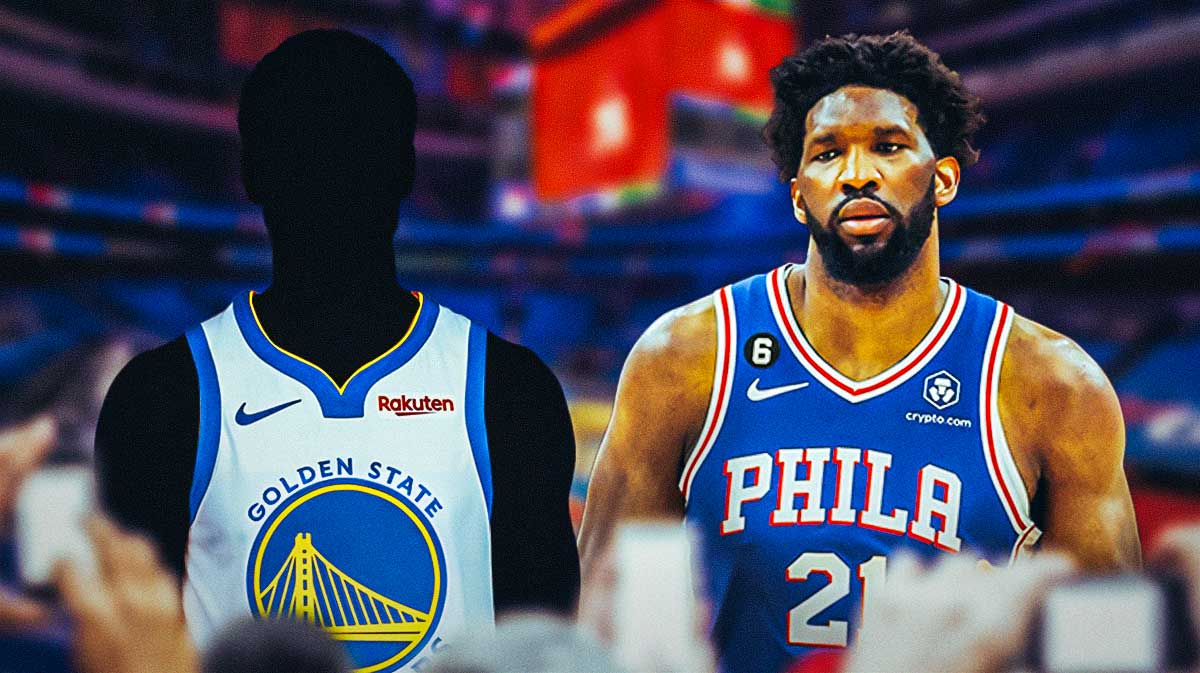 76ers' Joel Embiid next to a Warriors guard (Lester Quinones)