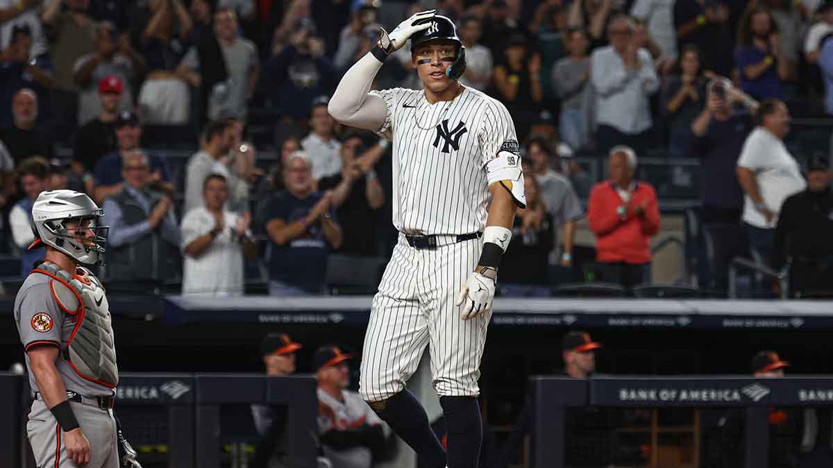 New York Yankees center fielder Aaron Judge (99) celebrates after hitting a two run home run during the seventh inning against the Baltimore Orioles at Yankee Stadium.