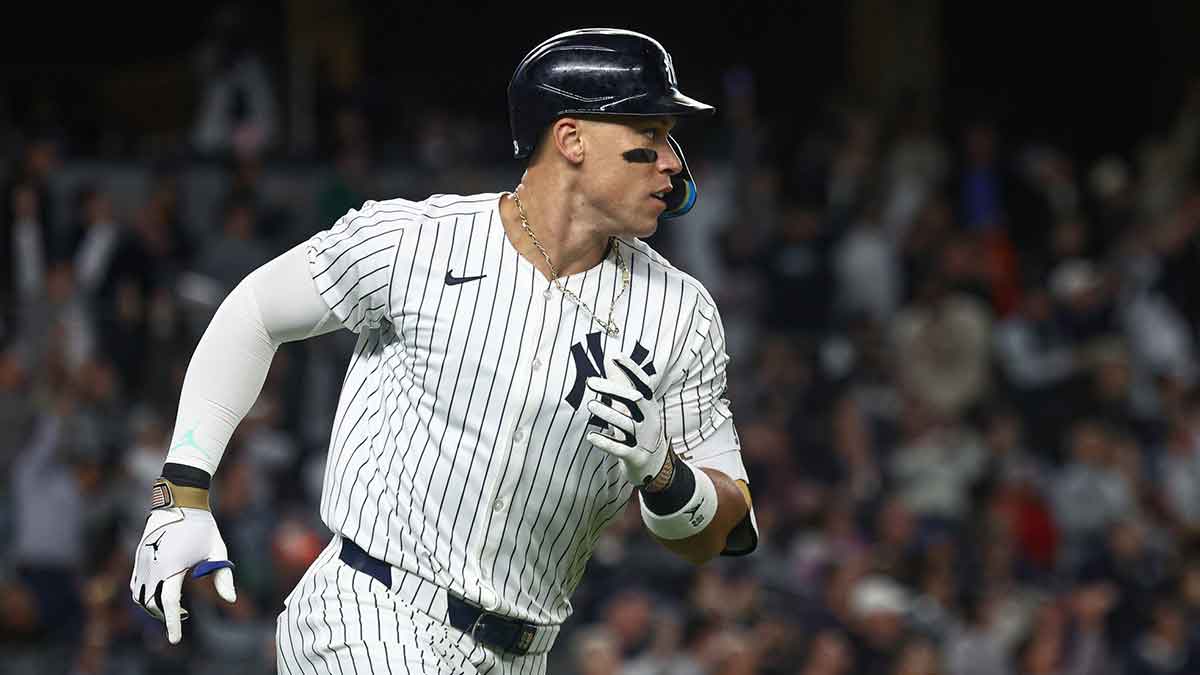 New York Yankees center fielder Aaron Judge (99) runs the base after hitting a solo home run during the fourth inning against the Baltimore Orioles at Yankee Stadium.
