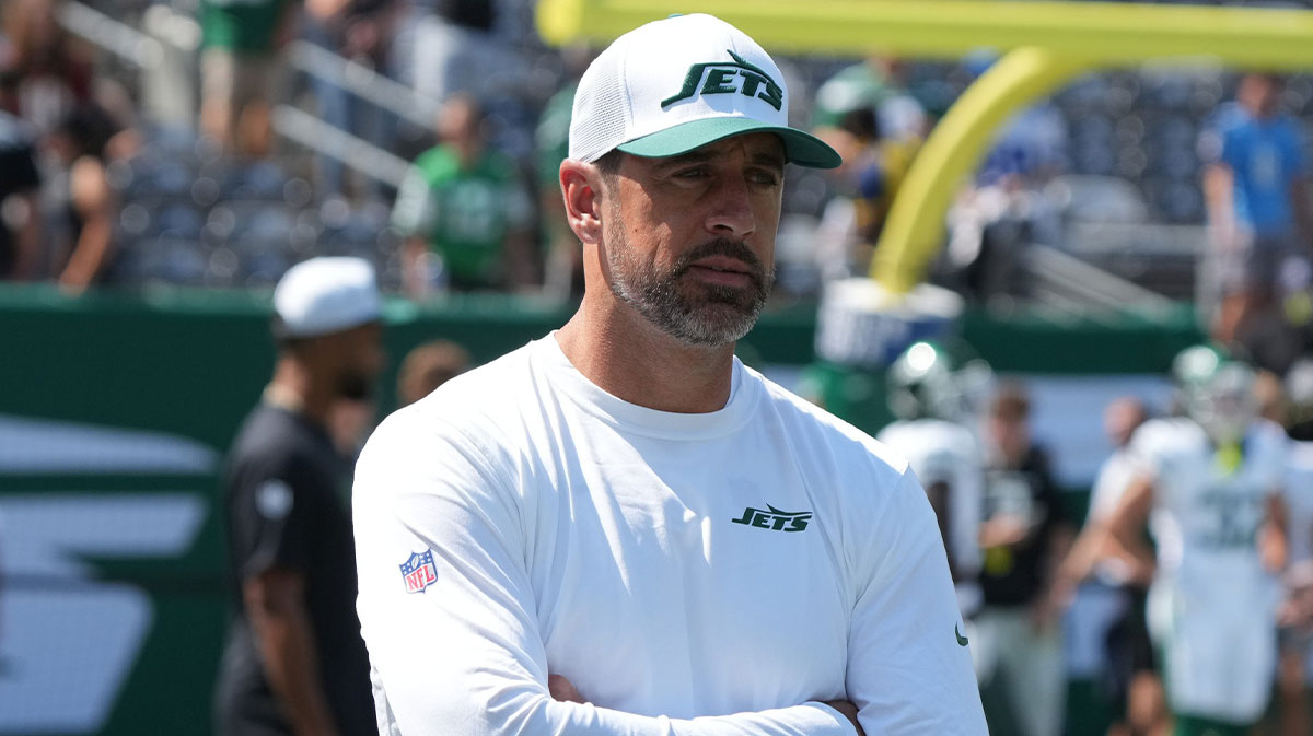 Aaron Rodgers, who wasn't dressed to play, during pre game warm ups as the Washington Commanders came to MetLife Stadium to play the New York Jets in the first preseason game of the 2024 season.