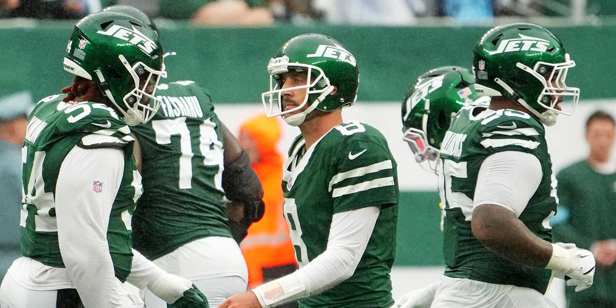 New York Jets quarterback Aaron Rodgers (8) reacts after the Jets failed to score on the Denver Broncos late in the fourth quarter at MetLife Stadium.
