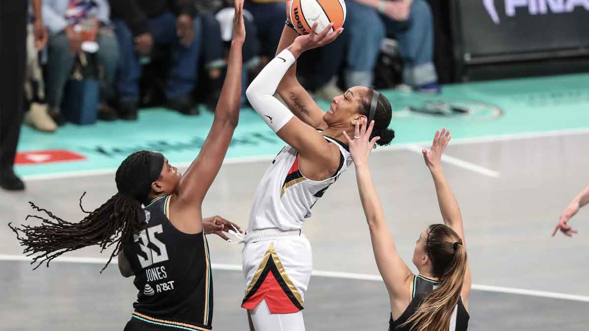 Las Vegas Aces forward A'ja Wilson (22) shoots over New York Liberty forward Jonquel Jones (35) in the first quarter during game three of the 2023 WNBA Finals at Barclays Center.