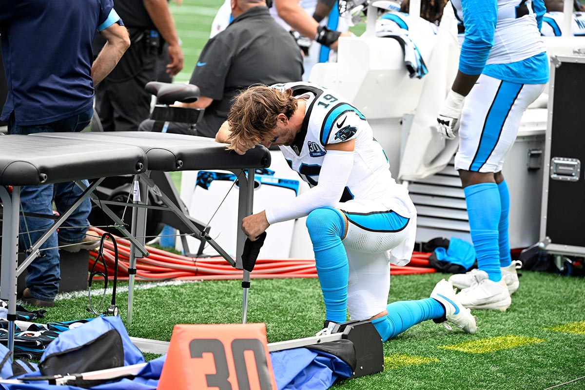 Carolina Panthers wide receiver Adam Thielen (19) takes a moment before the start of the third quarter at Bank of America Stadium.