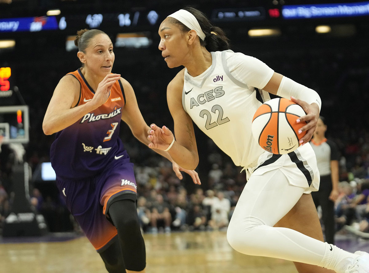 Phoenix Mercury guard Diana Taurasi (3) defends against Las Vegas Aces center A'ja Wilson (22) during the first quarter at Footprint Center on Sept. 1, 2024, in Phoenix.