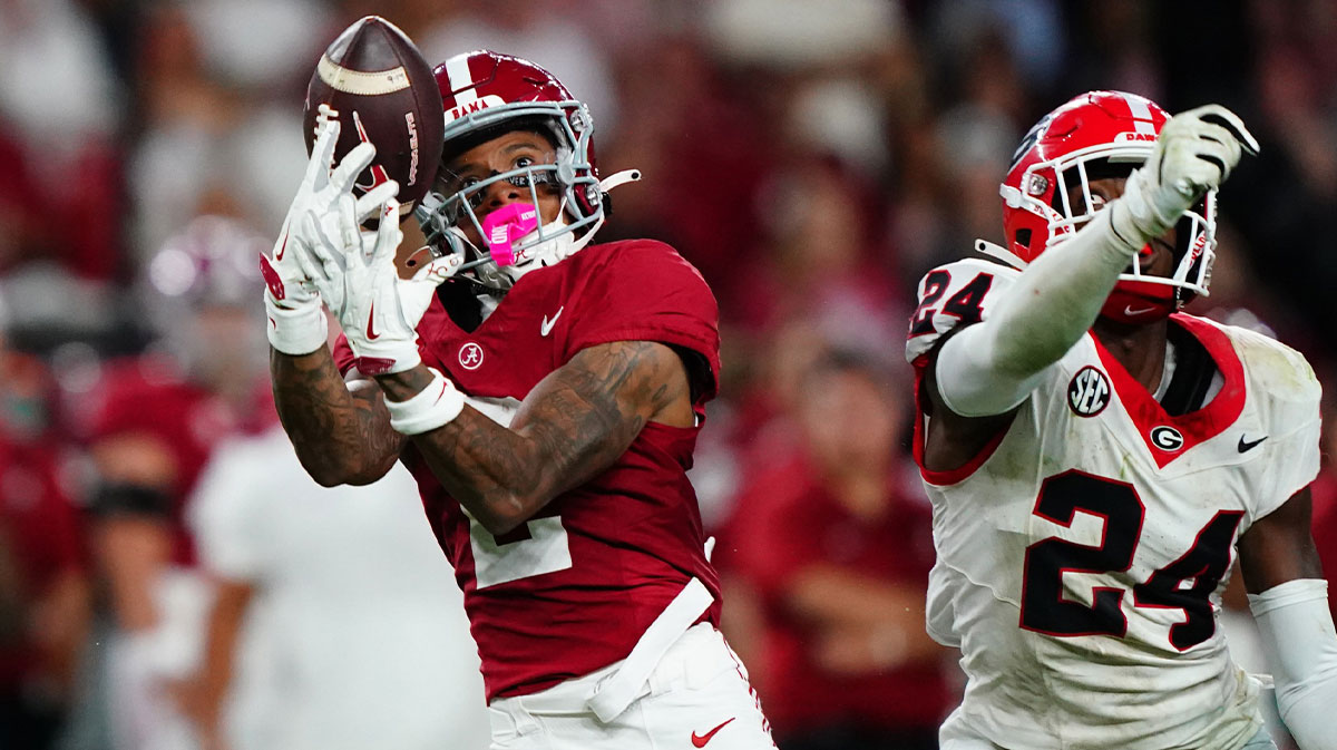 Alabama Crimson Tide wide receiver Ryan Williams (2) reaches for a pass against Georgia Bulldogs defensive back Malaki Starks (24) during the third quarter at Bryant-Denny Stadium