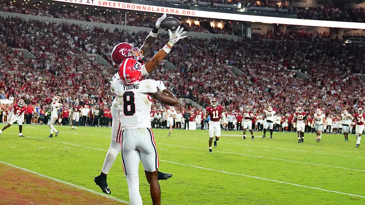 Alabama Crimson Tide defensive back Zabien Brown (2) intercepts a pass intended for Georgia Bulldogs wide receiver Colbie Young (8) during the fourth quarter at Bryant-Denny Stadium.