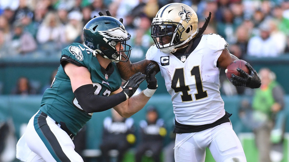 New Orleans Saints running back Alvin Kamara (41) is tackled by ]Philadelphia Eagles safety Reed Blankenship (32) during the third quarter at Lincoln Financial Field.