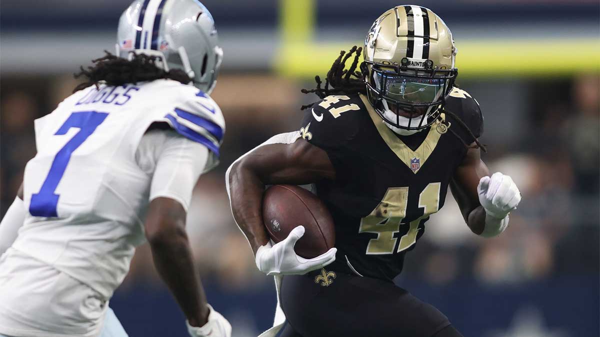 Sep 15, 2024; Arlington, Texas, USA; New Orleans Saints running back Alvin Kamara (41) runs against the Dallas Cowboys in the second half at AT&T Stadium. 